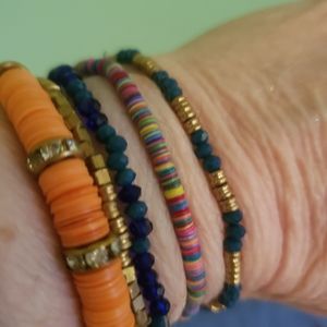 Beaded Bracelets/ plastic disk like also